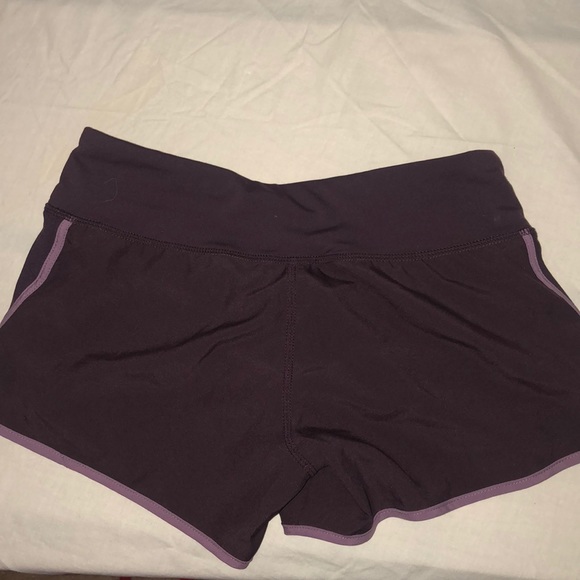 Purple ASICS workout shorts - Picture 2 of 3